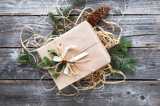 Stylish branding mockup to display your artworks. Cute vintage christmas new year gifts mock up on wooden background
