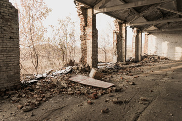 abandoned building. destroyed a military base. large hangar. garage for automotive equipment....