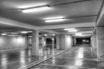 Empty underground parking garage (black and white)