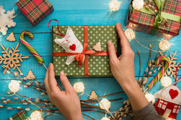 Obraz premium Christmas Hand made gift box toy on blue wooden background