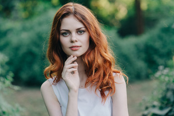 Young woman walking in the park

