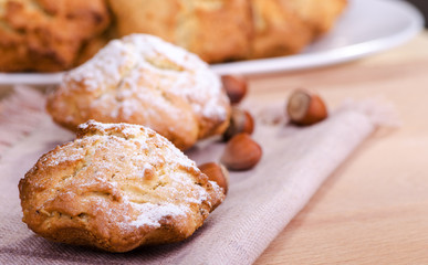 Baking, homemade cakes, nut cookies sprinkled with powdered sugar
