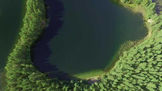 Lagoon island at lake Saimaa in Finland, aerial tilt shot