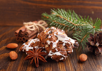 chocolate cookies with nuts, raisins and icing