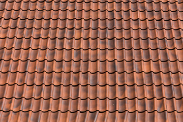 Red tiles roof background