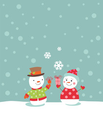 Loving couple of snowmen with gifts