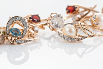 Gold rings, earrings with Topaz and pearls