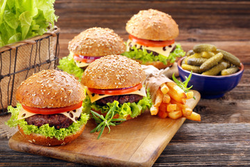 Hamburger with beef meat and fresh vegetables with empty space f