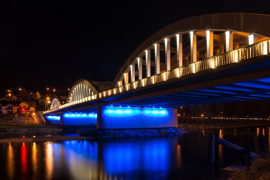 Concrete bridge illuminated in the night, Kroscienko, Poland