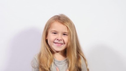 Girl holding her nose because of bad smell. A girl shows a gesture of bad smell. Funny girl shows dirty air. 