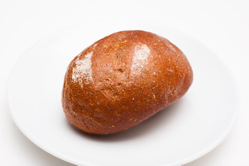 Loaf of brown bread.