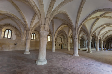 Ancient hall with historic architecture Alcobaca Monastery.