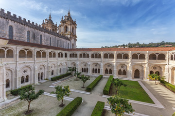 Fototapeta na wymiar Details of the courtyard Catholic monastery tower in the background.