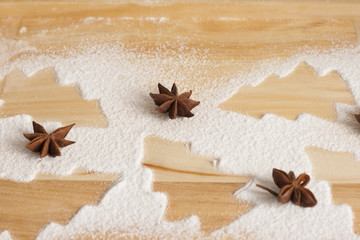 christmas gingerbread cookies baking process , dough and rolling pin,shallow depth of field.