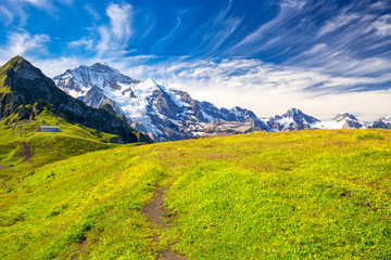 Eiger, Mönch and Jungfrau peaks from Männlichen in Swiss Alps