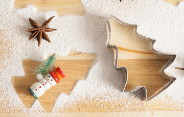 christmas gingerbread cookies baking process , dough and rolling pin,shallow depth of field.
