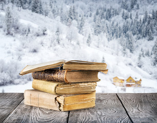 Old books on the wooden table