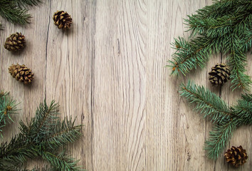 Christmas wooden background with natural decoration. Flat lay, top view
