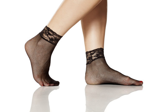 female feet in short nylon socks