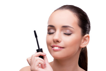 Obraz premium Woman brushing eyelashes isolated on white