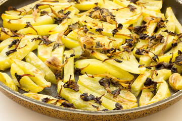 Tasty appetizer of baked potatoes with mushrooms