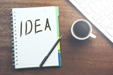 idea write on notepad and keyboard
