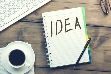 idea write on notepad and keyboard