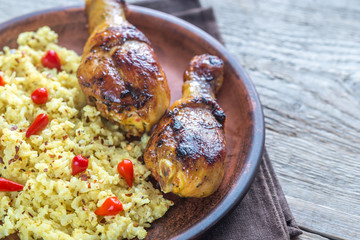 Spicy chicken drumsticks with rice curry
