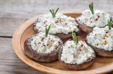 Baked mushrooms stuffed with cream cheese