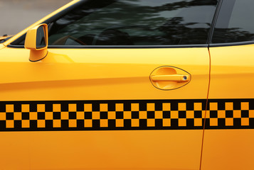 Yellow taxi cab, closeup. Taxi service concept.