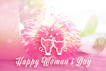 Text HAPPY WOMAN'S DAY on beautiful flower background