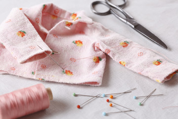 Obraz na płótnie Canvas Sewing baby clothes