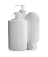 Cosmetic bottles on white background