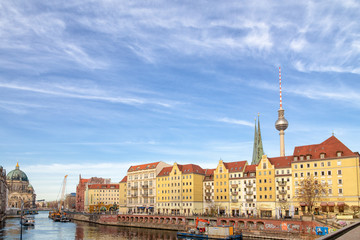 The river Spree in front of historic Nikolai Quarter with TV Tower "Alex" and Berlin Cathedral (Berliner Dom) in the background, Berlin.