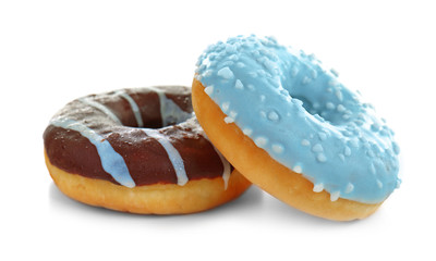 Tasty donuts on white background