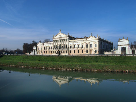 Travel in Italy - Nice view of Villa Pisani and the Brenta River, a famous venetian villas on the Riviera del Brenta, unesco world heritage and italian national museum, in Stra,  Veneto, Italy