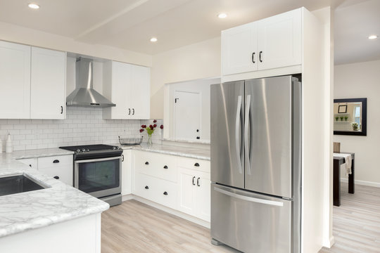 Modern, Bright, Clean, Kitchen Interior With Stainless Steel Appliances In A Luxury House