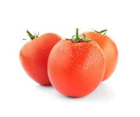 Red tomatoes on white background