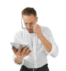 Handsome man with tablet on white background