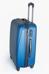 New modern carbon suitcase isolated on white