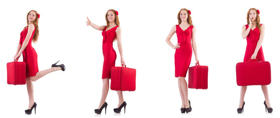 Young woman in red dress with suitcase isolated on white