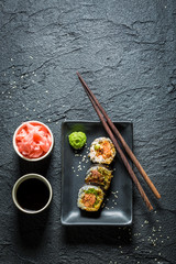 Delicious sushi made of salmon and avocado