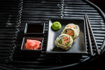 Fresh California Maki sushi with wasabi and soy sauce