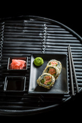 Tasty California Maki sushi with wasabi and soy sauce