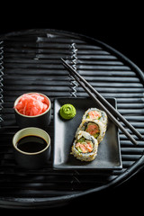 Fresh sushi made of salmon and avocado