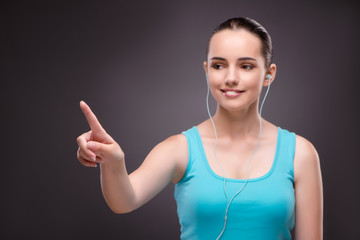 Woman in sports concept pressing buttons