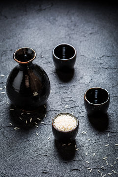 Prepared to drink sake in Asian restaurant on black rock