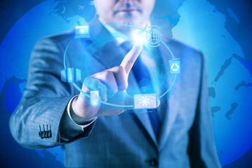 Businessman pressing buttons in computing concept