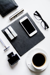 smartphone, electronic cigarette and men's accessories top view