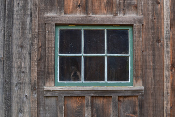 Gree window of log cabin